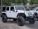 Thumbnail image of 2015 Jeep Wrangler Unlimited at Mac Haik Ford Houston Preowned