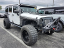 2012 Jeep Wrangler Unlimited Sport at Essential Ford