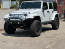Thumbnail image of 2013 Jeep Wrangler Unlimited at BUCKLEY AUTO CENTER