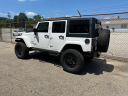 Thumbnail image of 2013 Jeep Wrangler Unlimited at BUCKLEY AUTO CENTER