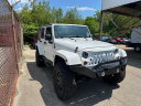 Thumbnail image of 2013 Jeep Wrangler Unlimited at BUCKLEY AUTO CENTER
