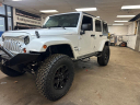 Thumbnail image of 2013 Jeep Wrangler Unlimited at BUCKLEY AUTO CENTER