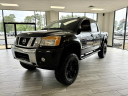 Thumbnail image of 2015 Nissan Titan at DIXIE MOTORS INC.