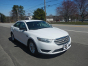 Thumbnail image of 2014 Ford Taurus at WHOLESALERS UNLIMITED LLC
